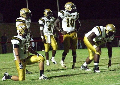 Image: Reid Jacinto(11), Justin Wood(44), Marvin Cox(3), Ryheem Walker(10) and Adrian Reed(64) try to find away against Hico’s offense.