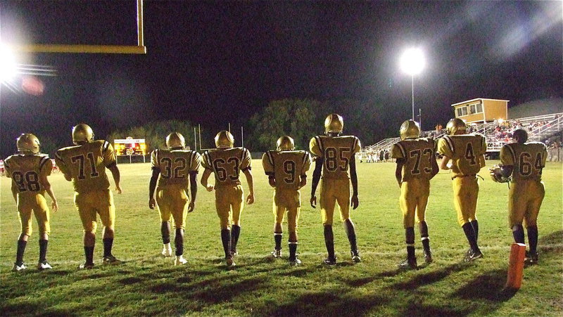 Image: The JV Gladiators get ready to enter the historical arena known as Willis Field.