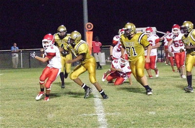 Image: Gladiator John Hughes(73) sacks the Hico quarterback.