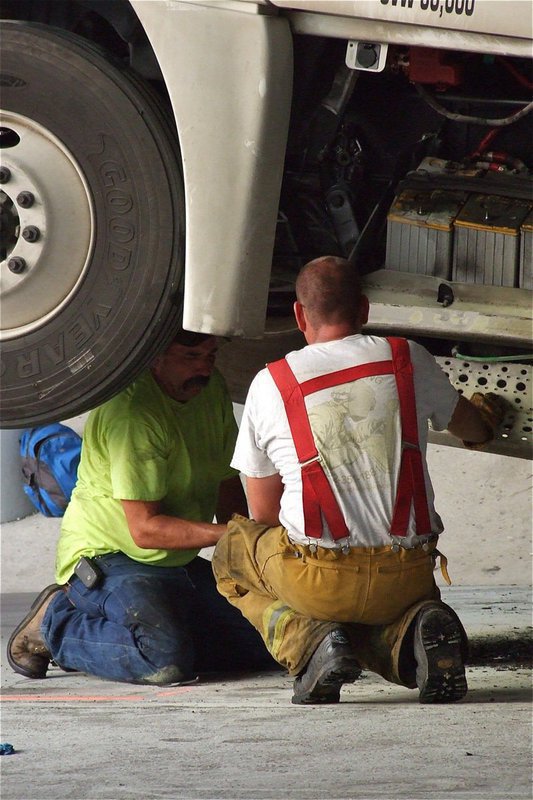 Image: Keith Helms of Helms garage and IFD’s Brad Chambers display their bravery.