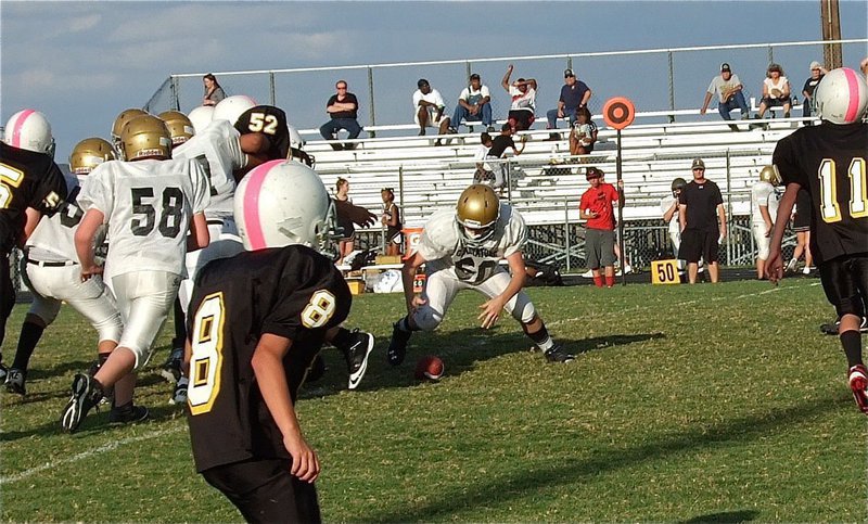 Image: Clay Riddle(60) pounces on a Wampus Cat fumble.