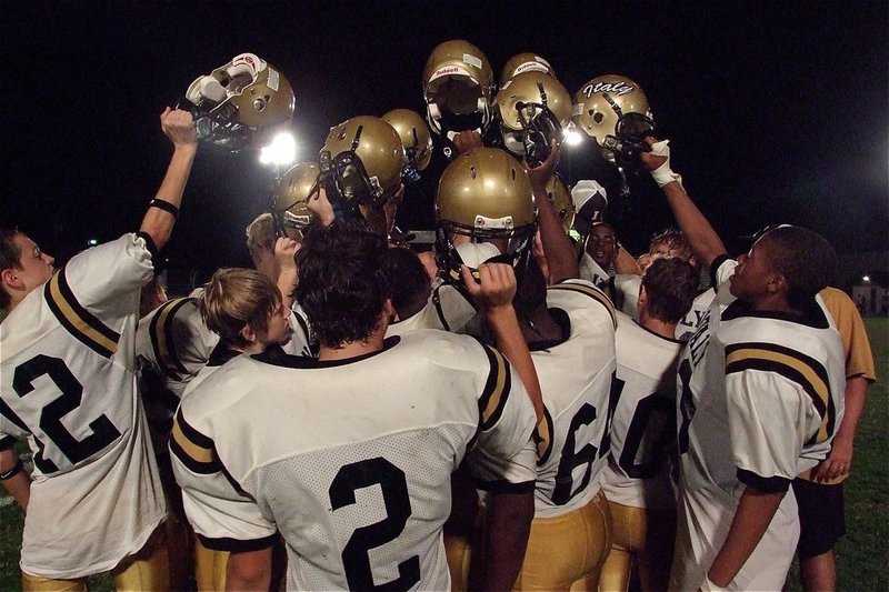 Image: The JV Gladiators celebrate their 20-6 win over the Itasca Wampus Cats to start 1-0 in district play.