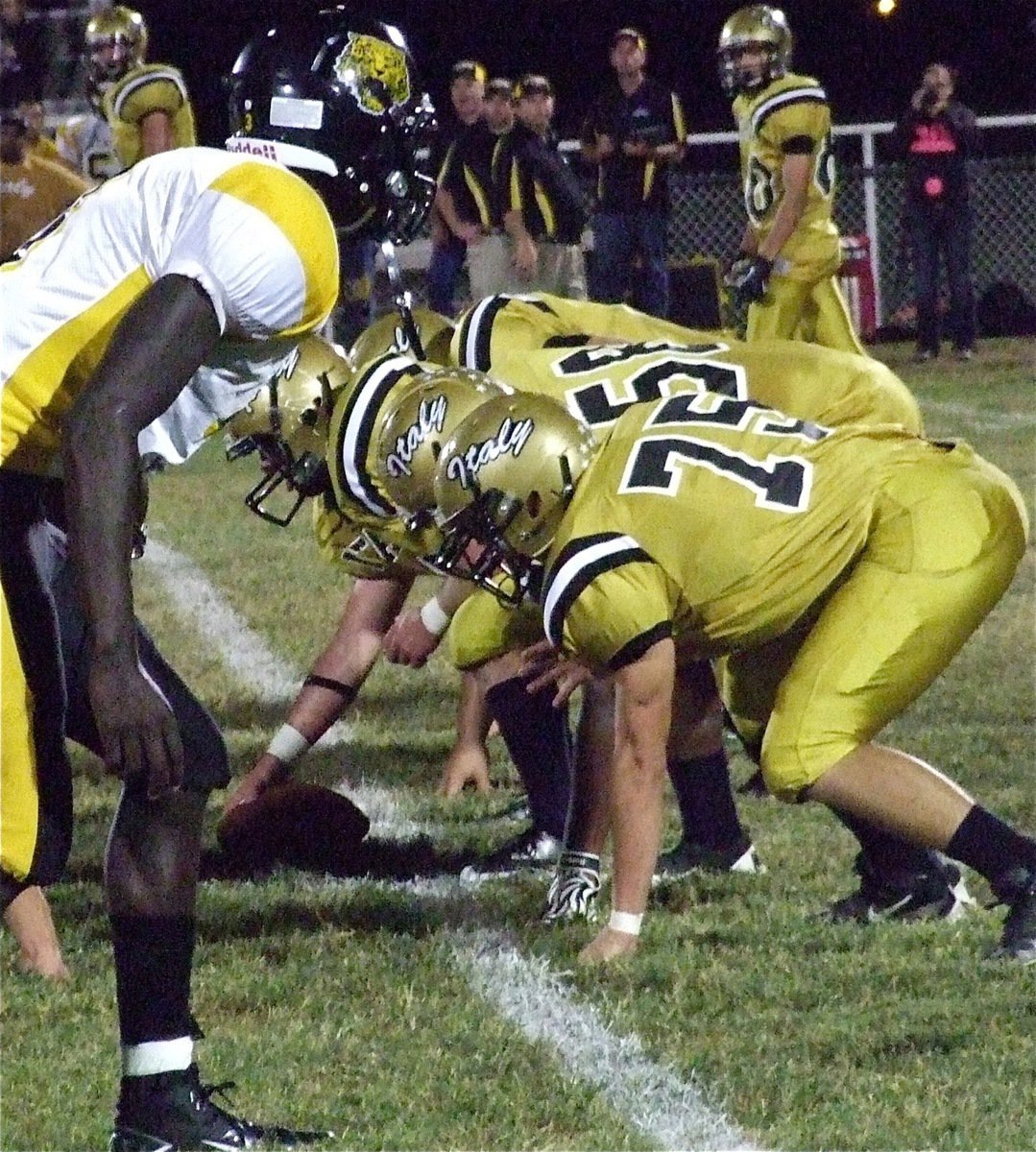 Image: Cody Medrano(75), Darol Mayberry(58) and center Kyle Fortenberry(66) help Italy’s offense rack up 485 yards of total offense and 7 touchdowns.