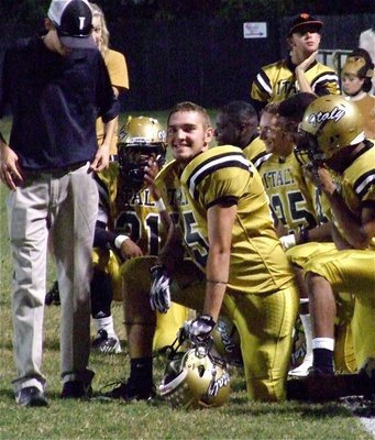 Image: Senior Zackery Boykin(55) is all smiles during an injury timeout.