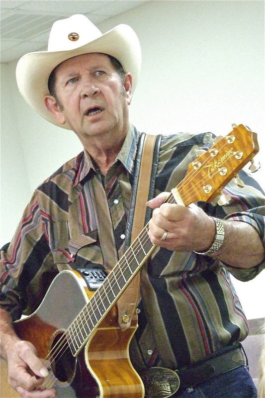 Image: Sam Dyar helps put on an entertaining Opry for all the folks.