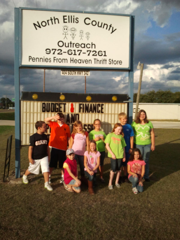 Image: Silver Spurs members collected food and worked at the North Ellis County Outreach center as another service project.