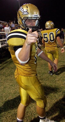 Image: Senior Gladiator Chase Hamilton(2) sends a message to Cayuga.