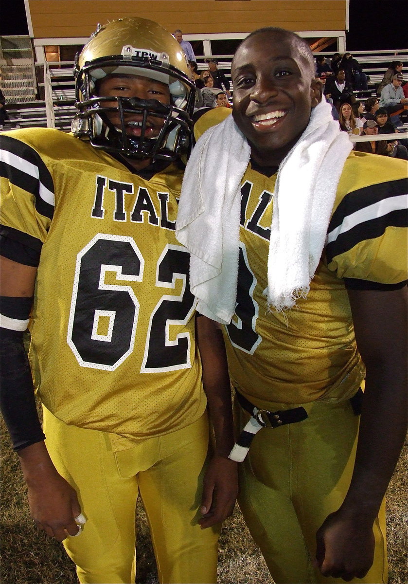 Image: Marvin Cox(3) congratulates teammate John “Squirt” Hughes(62) who was cheered on by Gladiator fans to the chant of, “Let’s go, Squirt, Let’s go Squirt!”