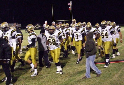 Image: The Gladiators take the field against the Cayuga Wildcats