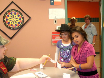 Image: Receiving their ballots.