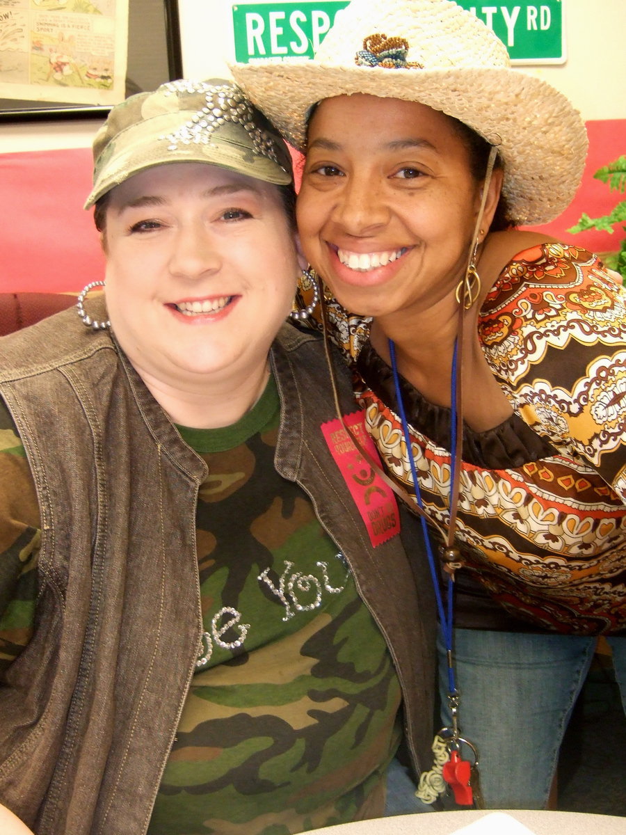 Image: Mrs. Bedard (counselor) and Mrs Wilson (principal) wore hats for Red Ribbon Week.