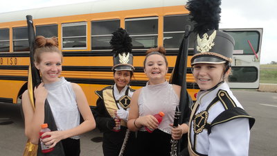 Image: Band and flag corp members get ready to perform.