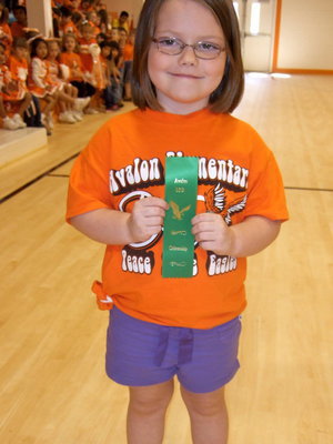 Image: She is proud of her citizenship award!