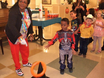 Image: He got the ring on the witches hat.