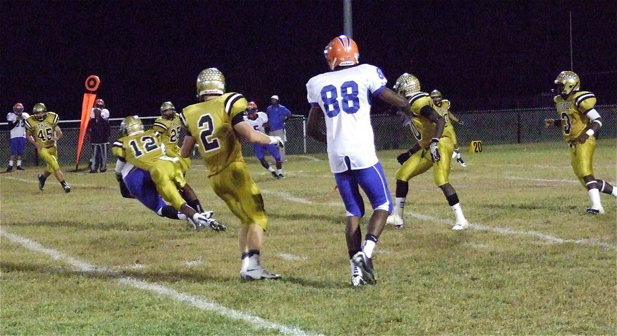 Image: Eric Carson(12) delivers a hit on a Gateway receiver during Italy’s 34-14 win over the Gators during Senior Night 2012 for the Gladiators. Italy is now 4-0 in district play and a win over Kerens will give the Gladiators sole claim to the 2012 district championship. A Kerens win could create a 3-way tie between Italy, Cayuga and Kerens.