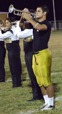 Image: Senior Gladiator defensive tackle Reid Jacinto helps with a few hits during halftime as well.