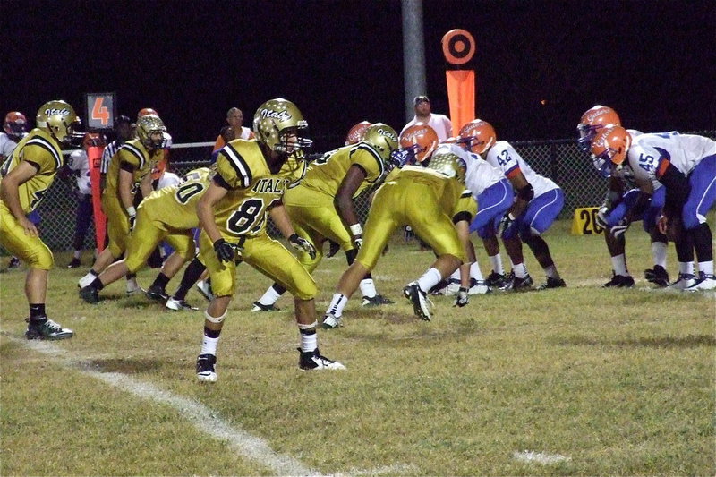 Image: Senior Gladiator Kelvin Joffre(80) drops back into pass coverage against the Gateway Gators.