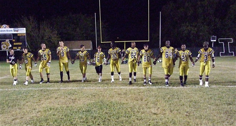 Image: Senior Walk: Gladiator seniors Hayden Wood(8), Chase Hamilton(2), Zackery Boykin(55), Cole Hopkins(9), Reid jacinto(11), Caden Jacinto(6), Ryheem Walker(10), John Hughes(62), Kelvin Joffre(80), Adrian Reed(64), Jalarnce Jamal Lewis(21) and Marvin Cox(3) take their final senior walk on Willis Field after defeating the Gateway Gators 34-14 during their final home game.