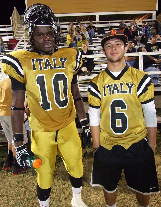 Image: Senior Gladiators Ryheem Walker(10) and Caden Jacinto(6) bask in the glow of their 4th straight district win by defeating Gateway 34-14.