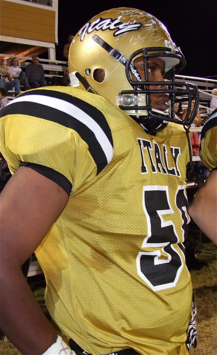Image: Gladiator lineman, Darol Mayberry, Jr.,(58) takes a break from the action.