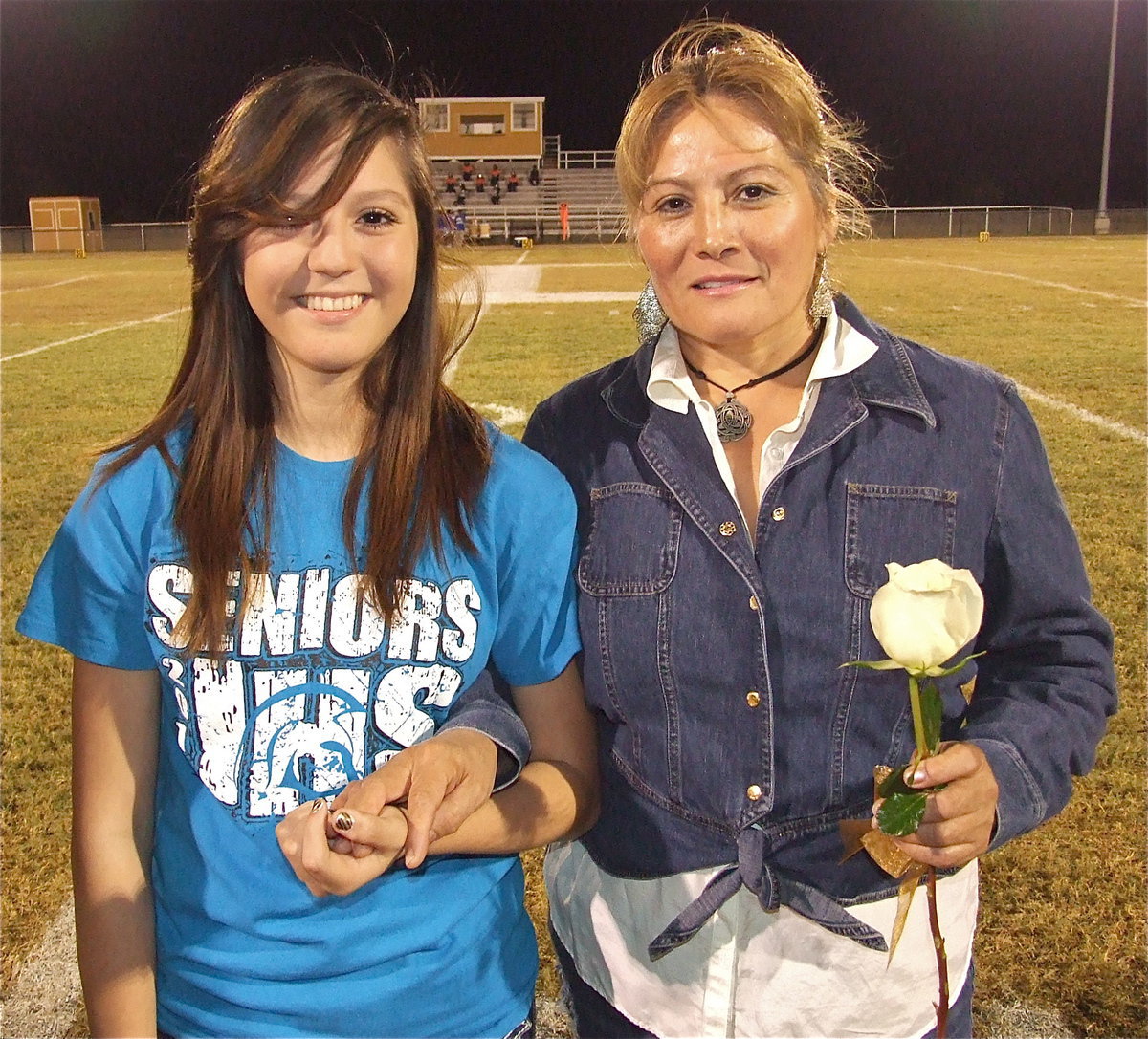 Image: Lady Gladiator volleyball player Paola Mata is escorted by her mother, Paola Gonzalez. Paola’s goals after graduation are to attend the University of Health and Sciences in San Antonio and become a dental hygienist.