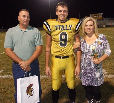 Image: Senior Gladiator Cole Hopkins(9) is escorted by his parents Cassandra and Brad Hopkins. Cole will attend Rhodes College in Memphis, Tennessee on a basketball scholarship and plans to become a firefighter. His most memorable moment in athletics was the regional basketball tournament his sophomore year.