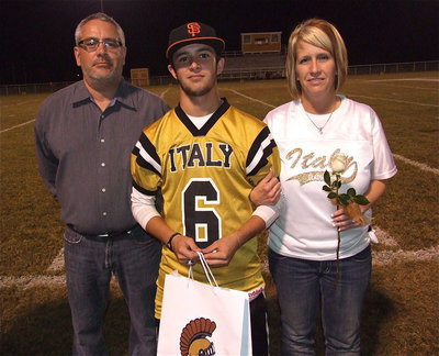 Image: Senior Gladiator Caden Jacinto(6) is escorted by his parents Vincent and Lisa Jacinto. Caden will attend junior college where he can pursue his dream to play baseball at the next level before eventually becoming a business owner in the custom millwork industry. His most memorable moment in athletics was during the 2011-12 varsity basketball season at home against Clifton when he made six 3-point shots and had 24 total points.