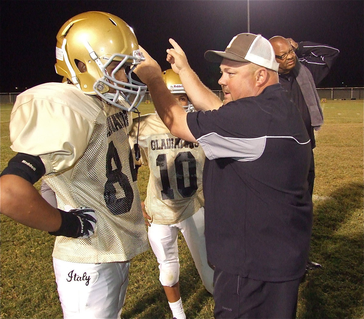 Image: Coach Wayne Rowe directs Fabian Cortez(84) and Tylan Wallace(19).