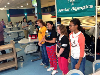 Image: Katie Conner stands to receive her awards.