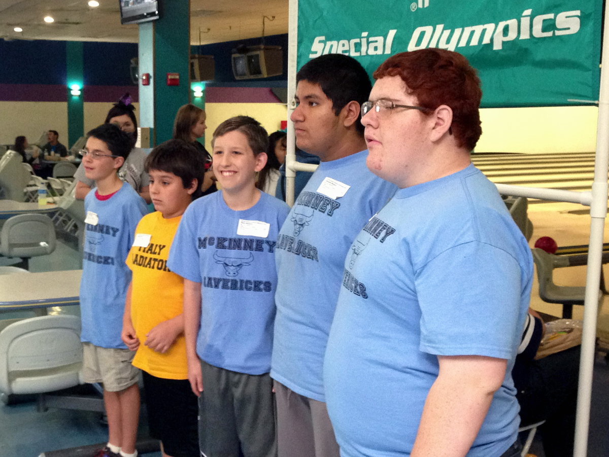 Image: Mikey South stands to receive his silver metal.