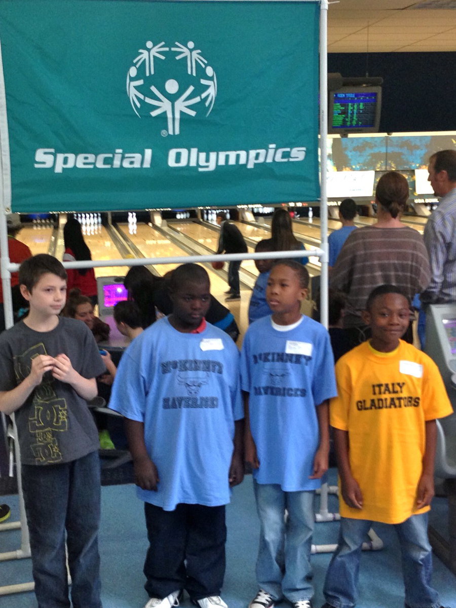 Image: Montavian McDaniel Stands to receive his bronze metal.