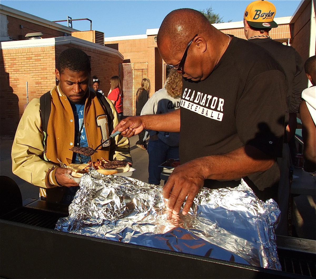 Image: Jalarnce Lewis has his game face on as Coach Mayberry risks injury to serve the talented and hungry senior.