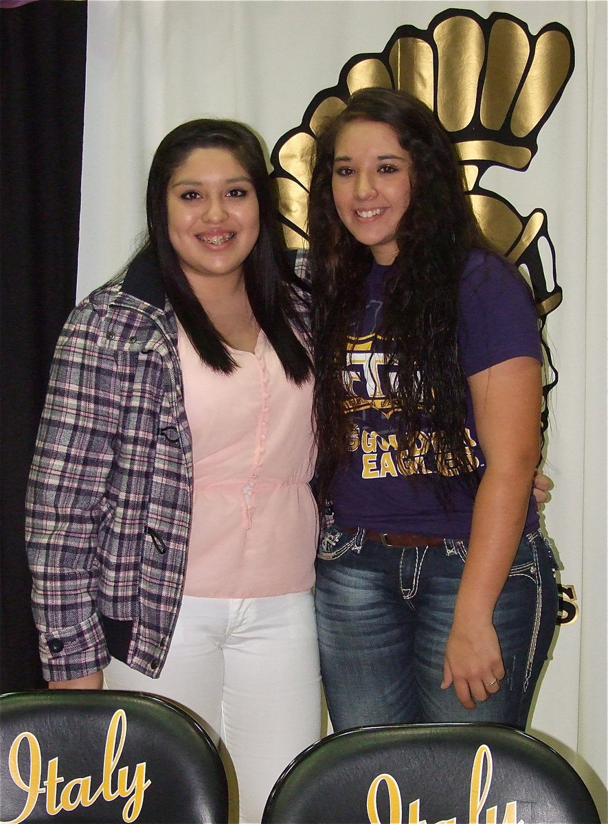 Image: Lady Gladiator teammate Monserrat Figueroa congratulates Alyssa Richards on her achievement to play collegiate level softball.