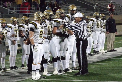Image: Gladiator senior captains Chase Hamilton(2), Ryheem Walker(10), Zackery Boykin(55) and Cole Hopkins(9) prepare for the coin toss.