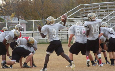 Image: Marvin Cox(3) passes out of the pocket.