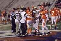 Image: Gladiator senior captains Caden Jacinto(6), Kelvin Joffre(80), Reid Jacinto(11) and Adrian Reed(64) wish the Honey Grove captains luck.