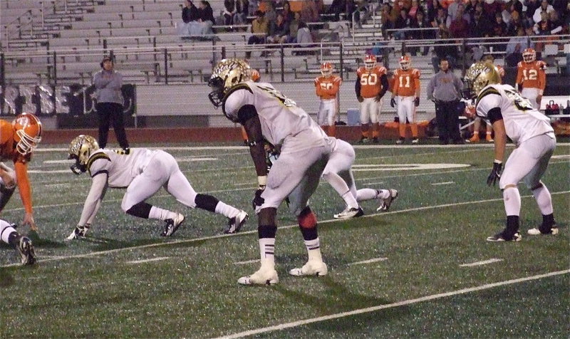 Image: Gladiator linebackers Ryheem Walker(10) and Shadrach Newman(25) prove they are too physical for the Warriors offense.