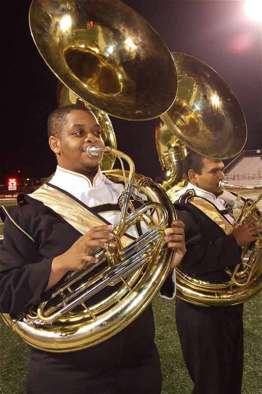Image: The tuba section: Gladiator Regiment Band members Timothy Fleming and Jonathan Davila rock the halftime performance.