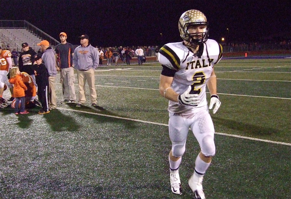 Image: Italy’s Chase Hamilton(2) trots off the field a regional semifinal champion.