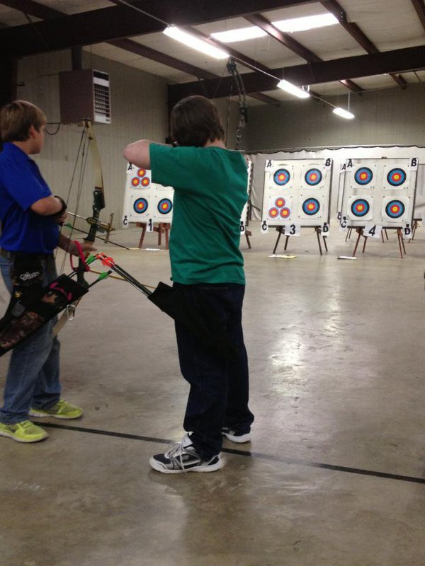 Image: Austin Sillivan takes aim to win his intermediate division.