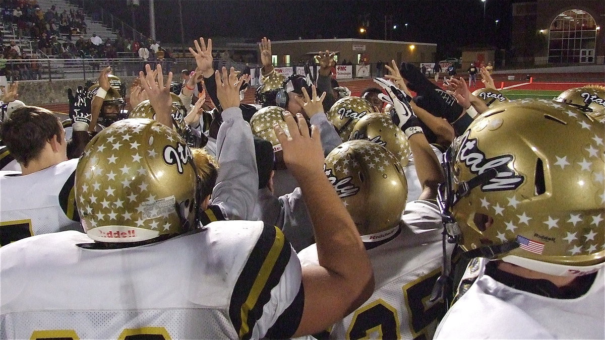 Image: Leading 6-3, Italy Gladiator head coach Hank Hollywood rallies his troops for the fourth-quarter during their quarterfinal matchup against the Goldthwiate Eagles this past Friday at Tiger Stadium in Glen Rose. The Gladiators scored on the first play of final quarter and then contained the Eagles to eventual win 14-3.