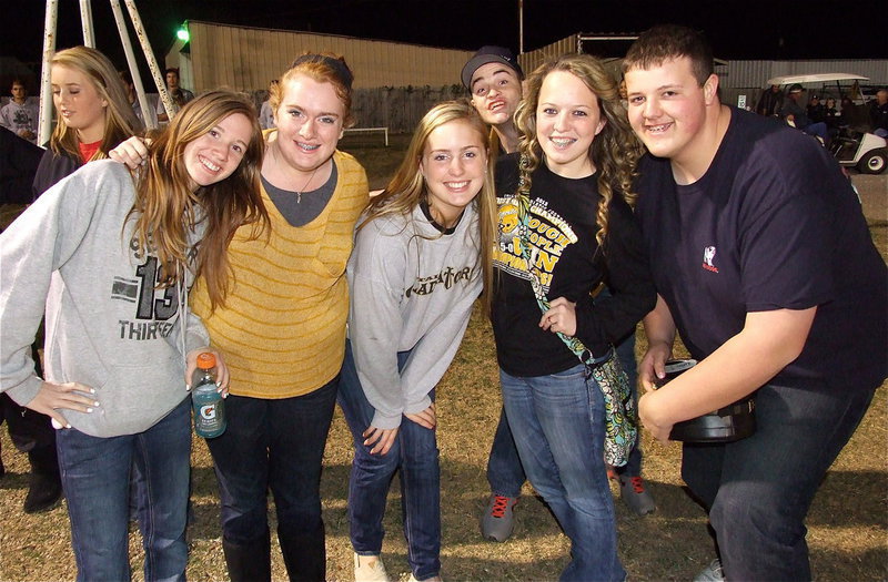 Image: Brooke Miller, Emily Stiles, Madison Washington, Hayden Woods, Maddie Pittman and Zac Mercer mug for the camera before the pap rally.