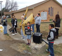Image: In anticipation of the upcoming semifinal matchup against Stamford, Gladiator fans converge on downtown Italy to give the team a spirited sendoff as the speaker on the corner blasts the Gladiator fight song.