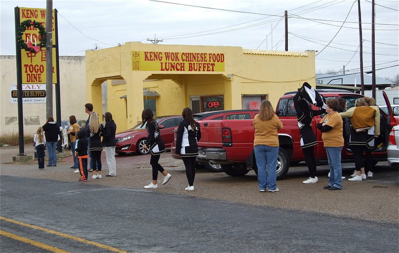 Image: Gladiator fans line the streets as the team buses approach downtown Italy.