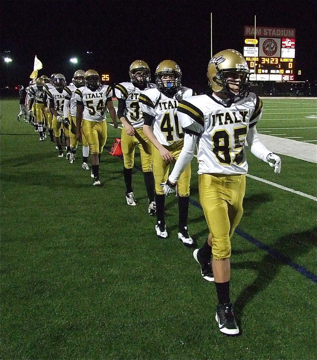 Image: Gladiators Levi McBride(85), CLayton Miller(40), Ty Windham(36) and Justin Robbins(64) get ready to rumble in the state semifinal matchup against Stamford.