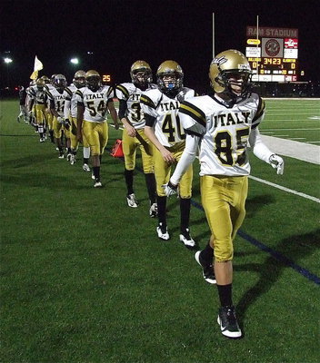 Image: Gladiators Levi McBride(85), CLayton Miller(40), Ty Windham(36) and Justin Robbins(64) get ready to rumble in the state semifinal matchup against Stamford.
