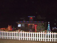 Image: First place winner was the residence of Conrad and Gayle Kinsey, complete with an outdoor theater to watch Rudolph.