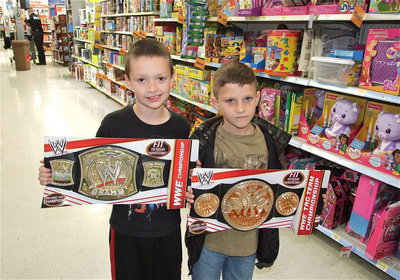 Image: Christopher Cryer and Chance Shaffer are ready to rumble with new championship wrestling belts. The gift that keeps on giving…