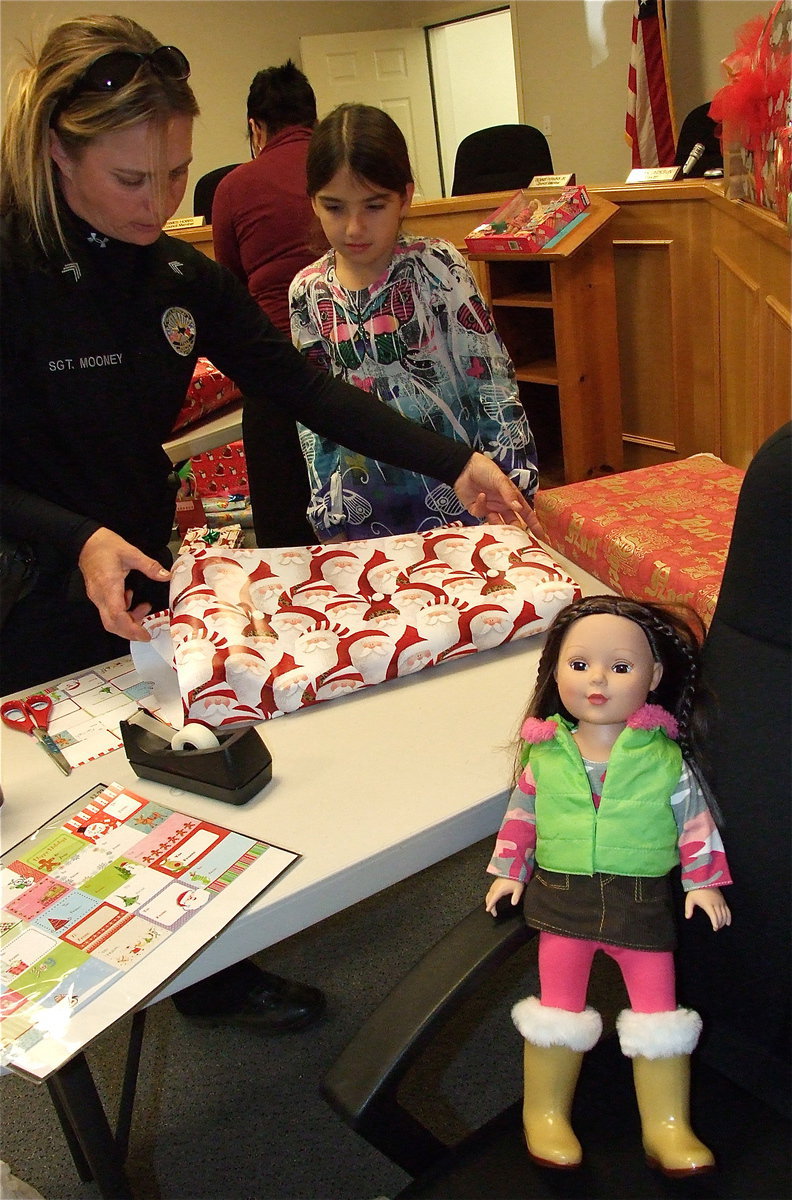 Image: This amazing, stair at you everywhere you go, doll, supervises Sergeant Tierra Mooney and Farrah Eglich.