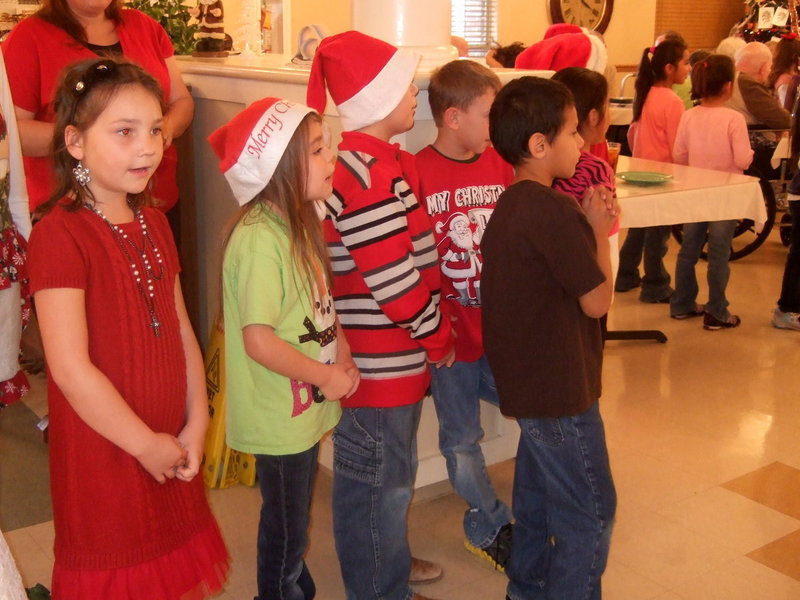 Image: More Christmas carolers.